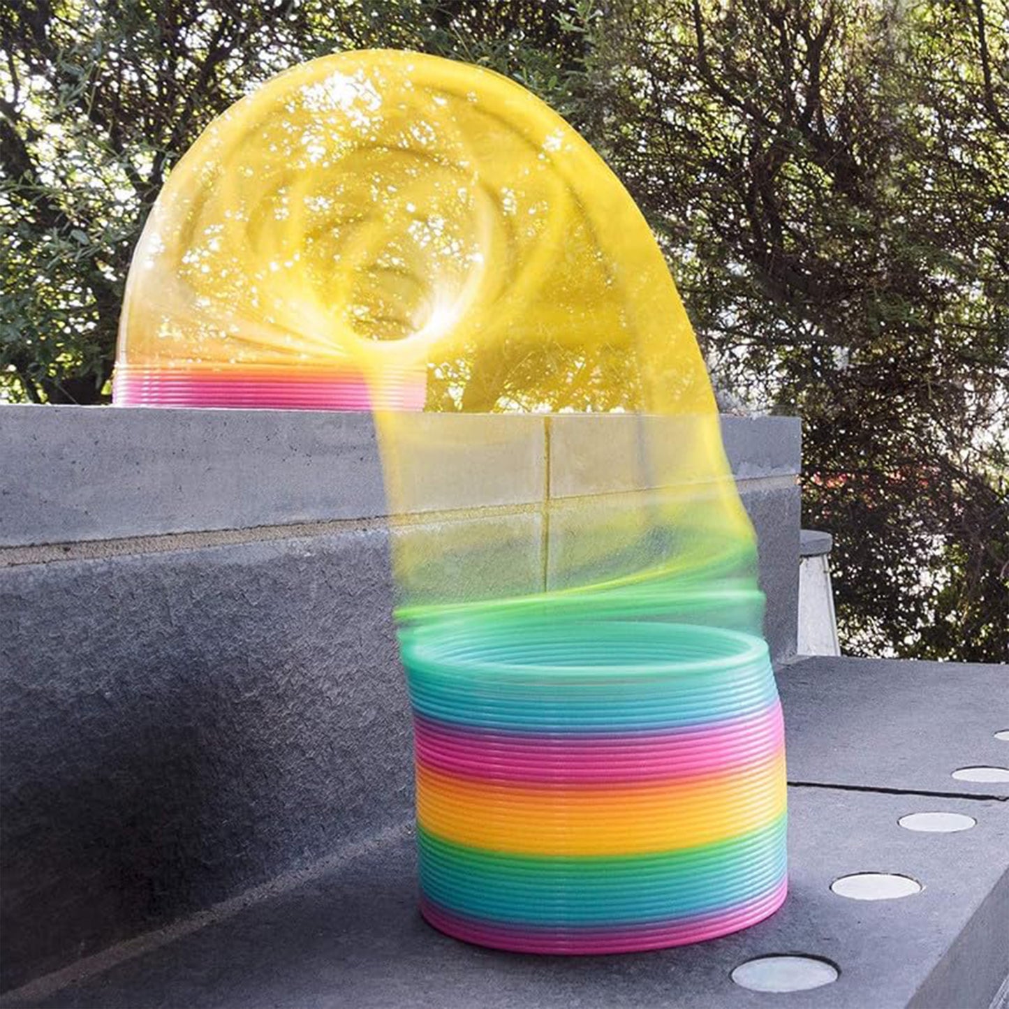 Wukusy Rainbow Spring toy, colorful flexible slinky for kids and adults, compact, portable, and easy to carry.