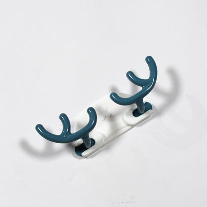 Set of four Wukusy plastic wall hanger hooks with adhesive backing for home improvement and organization.