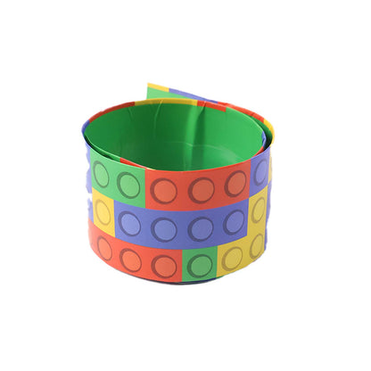 Colorful Snap Slap bracelet toy by Wukusy showing a vibrant, flexible bracelet with bright colors and snap closure.