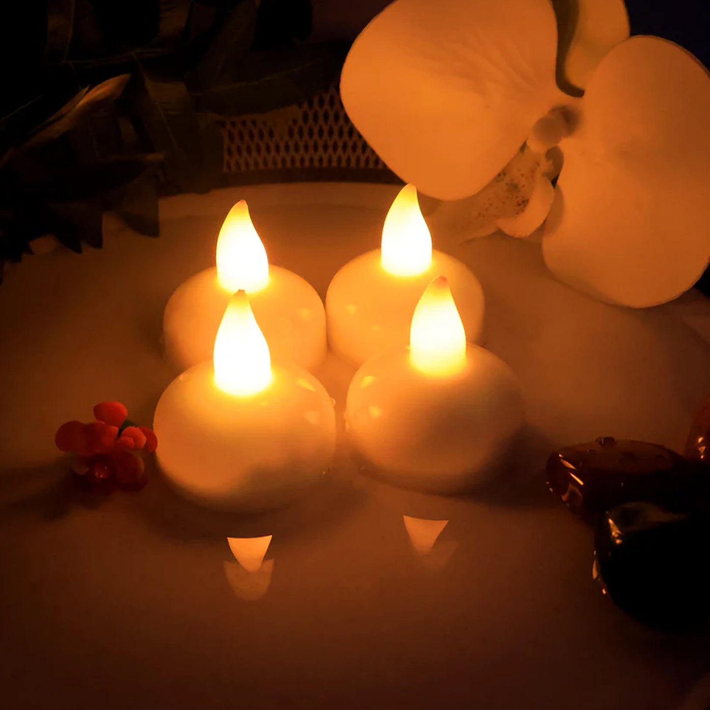Set of 8 round LED flameless tealight candles by Wukusy, ideal for home decor, with realistic flickering warm light.