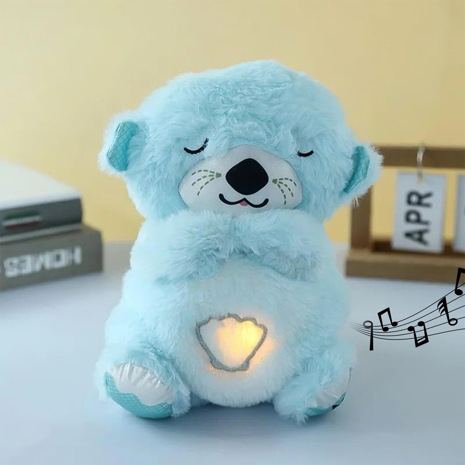 Soft plush Wukusy musical teddy bear toy with LED light, perfect for cuddling and soothing children.
