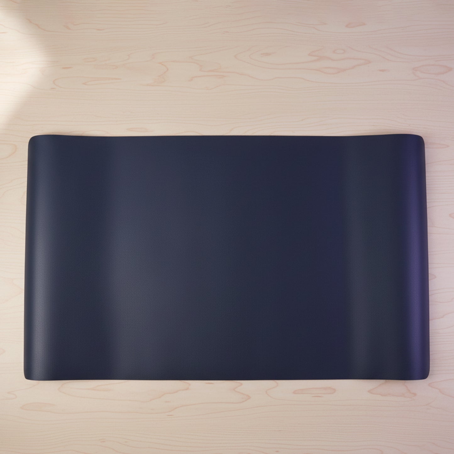 Large Wukusy premium desk mat and mouse pad, 60x35 cm, with smooth surface for comfortable computer use.