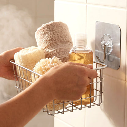 Self-adhesive plastic wall hook for bathroom by Wukusy, mounted on a tiled wall for hanging towels or accessories.