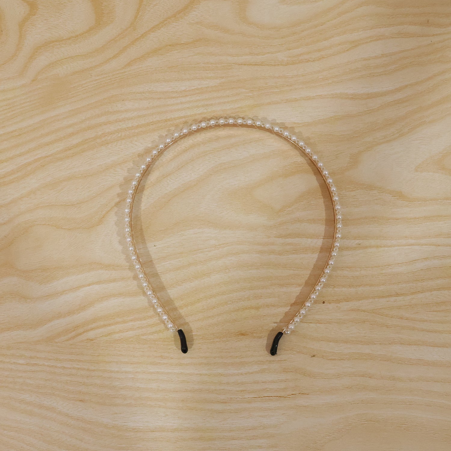 Wukusy premium styling pearl embellished stylish hairband featuring elegant pearls and a sleek design for fashionable hair accessories.