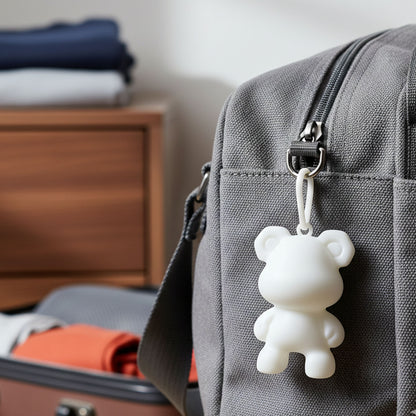 Cute bear-shaped mini figure keychain by Wukusy, showcasing a small, adorable bear design with a keyring attachment.