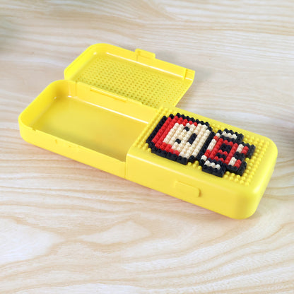 Wukusy DIY pixel art pen stand with building block set, featuring colorful blocks and an office desk setup.
