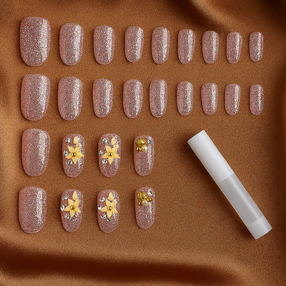 Wukusy premium glitter 3D floral press-on artificial nail tips with nail glue, featuring sparkling floral designs in a set