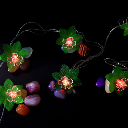 Wukusy leaf and flower LED decorative string light, 3 meters long, with warm white LED bulbs on a flexible wire for ambient decor.