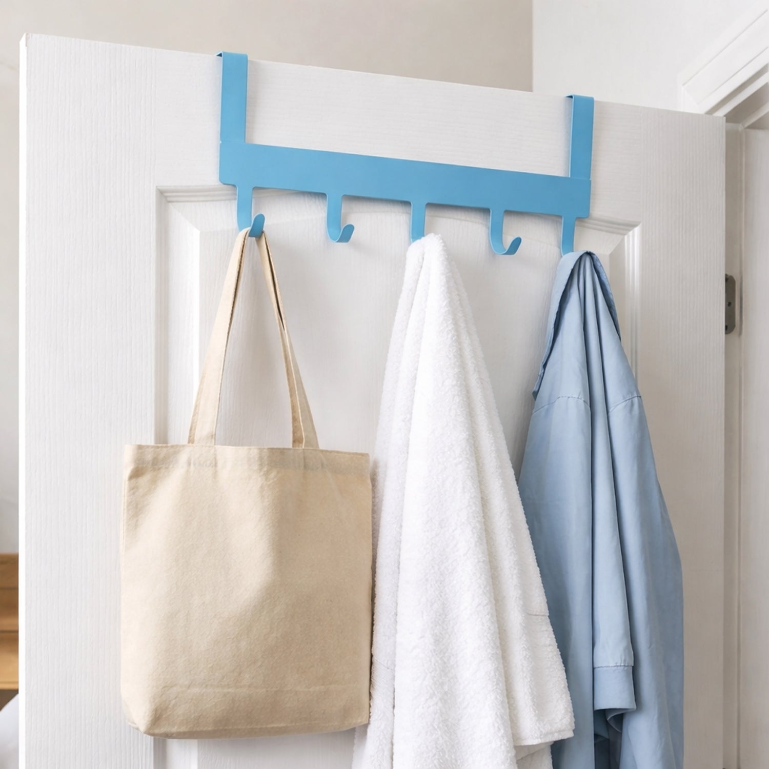 Wukusy multi-purpose metal hanging rack with five hooks, ideal for organizing kitchen, entryway, or closet spaces.
