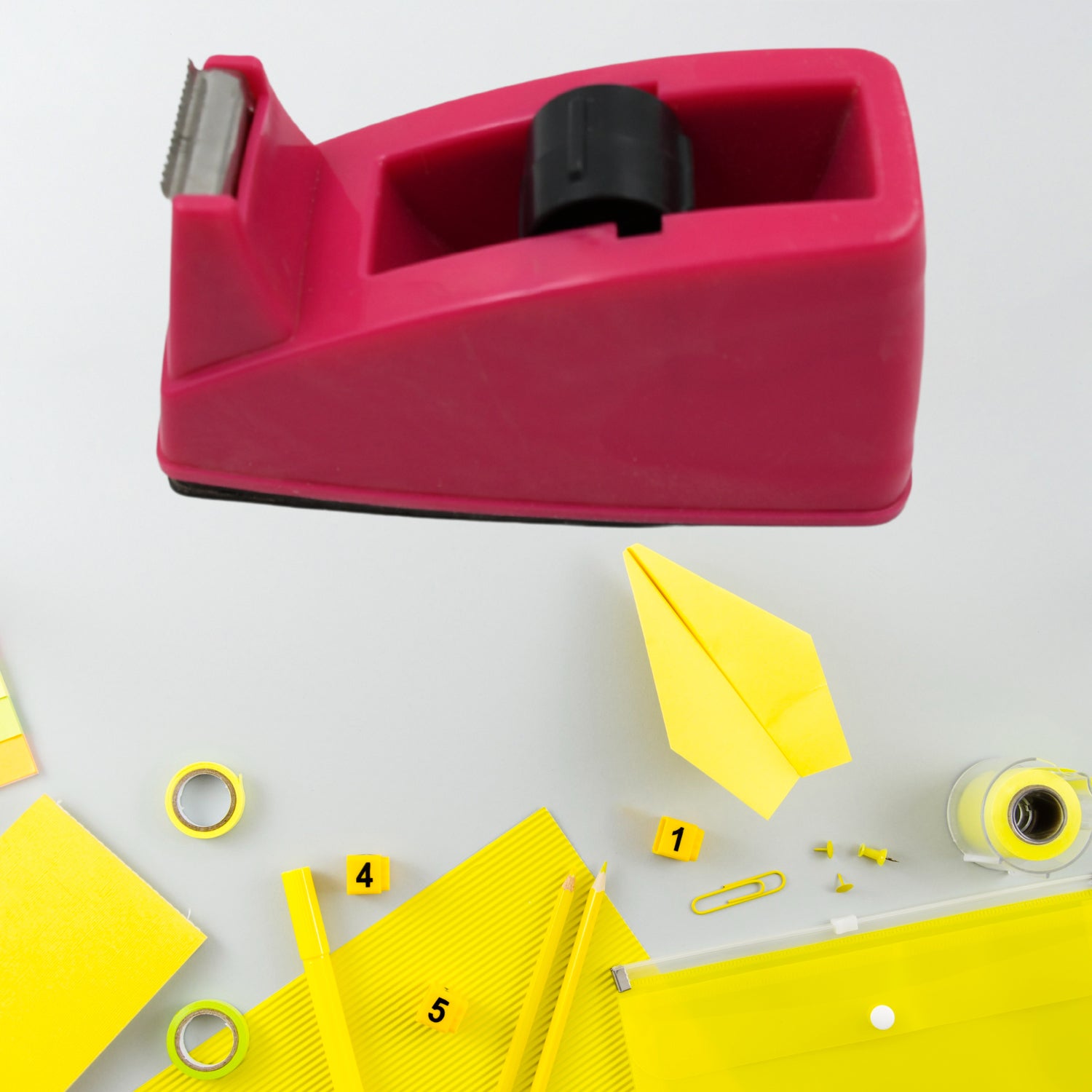 Wukusy 9513 plastic tape dispenser cutter for home office and school use, with a built-in blade for packaging and stationary tape.