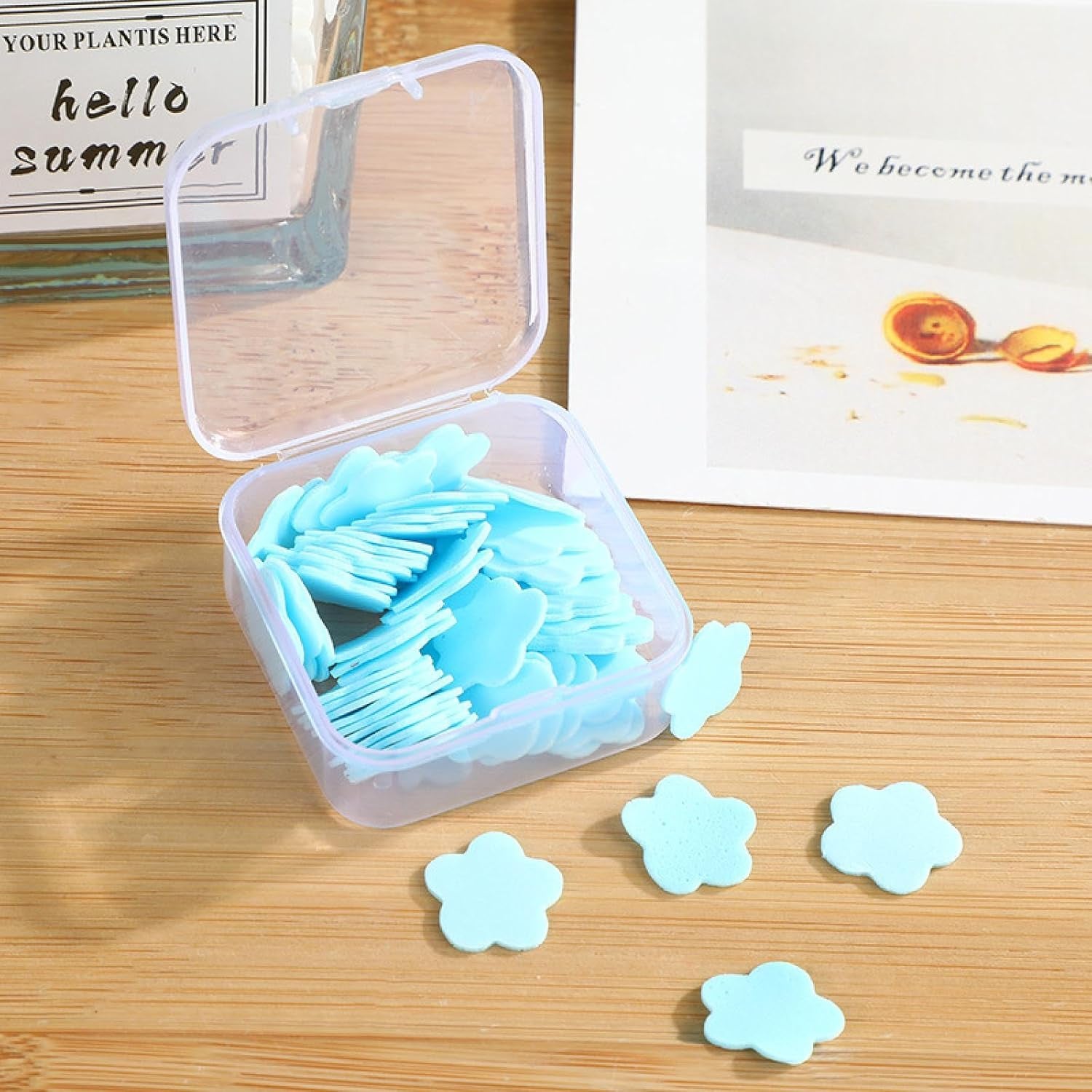 Wukusy mini portable travel soap paper sheets in flower shape, 100 pack, colorful, ideal for hygiene on the go.