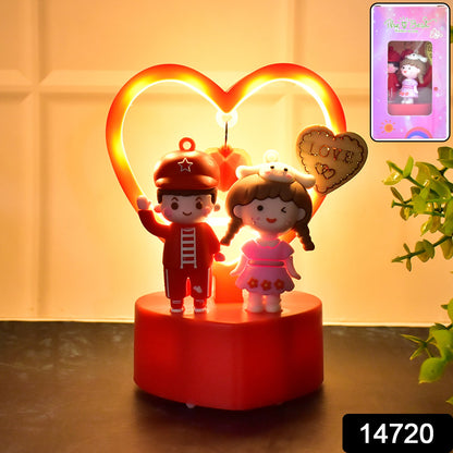 Wukusy romantic couple love showpiece with heart frame, depicting a couple in a loving pose, displayed in a decorative stand.