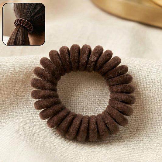 Soft stretchable telephone wire style hair band from Wukusy, shown in a close-up with a flexible, durable design.