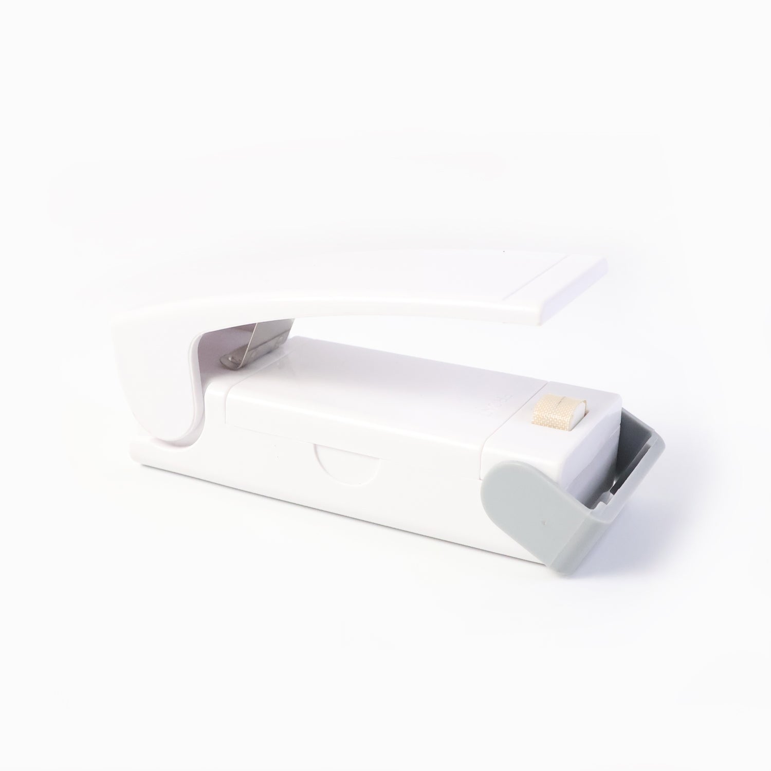 Wukusy portable mini heat sealer machine sealing plastic bags, compact home and kitchen tool for airtight storage.