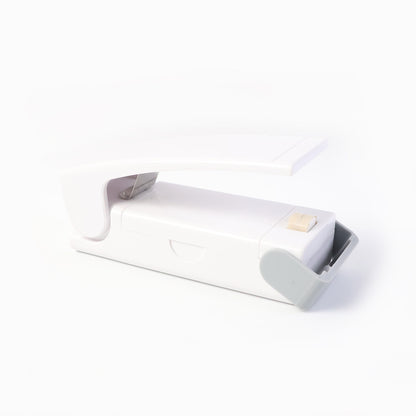 Wukusy portable mini heat sealer machine sealing plastic bags, compact home and kitchen tool for airtight storage.
