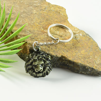 Wukusy premium lion head metal keychain with detailed lion face design and sturdy keyring, displayed against a neutral background.