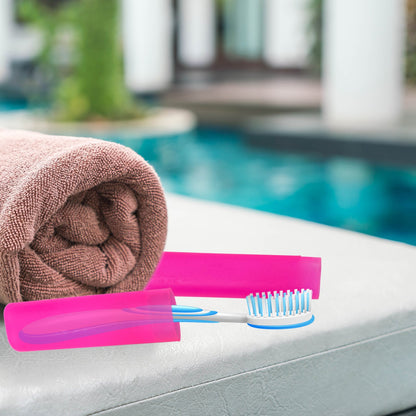 Set of four Wukusy portable dust-proof toothbrush cases with individual compartments for travel storage and protection.