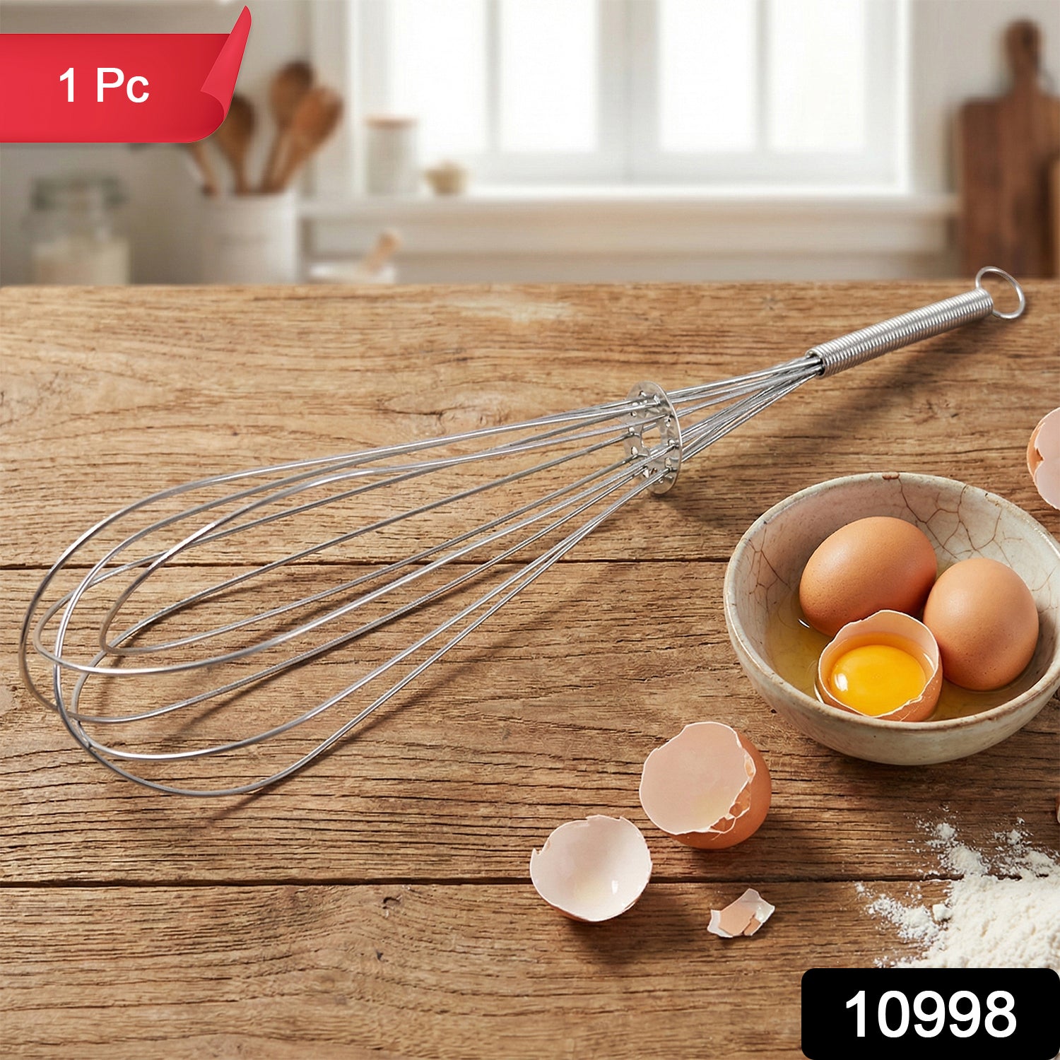 Wukusy manual stainless steel egg beater whisk with ergonomic handle for efficient mixing and beating of eggs and batter.