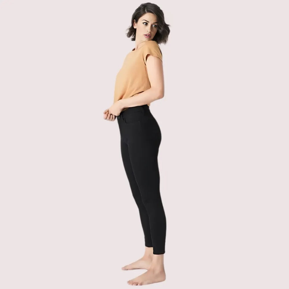 Women's black skinny fit jeans with sleek silhouette by Snazzyway, shown on a model highlighting the slim, fitted design.