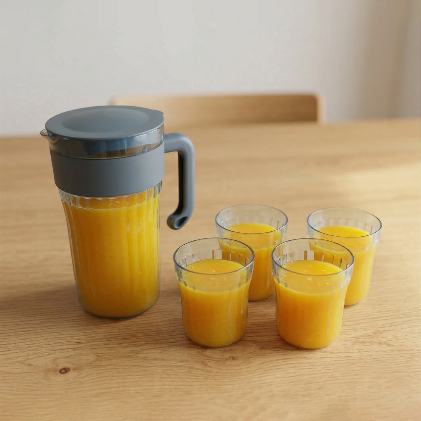 Wukusy plastic water and juice serving jug with four matching glasses, ideal for beverages and entertaining.