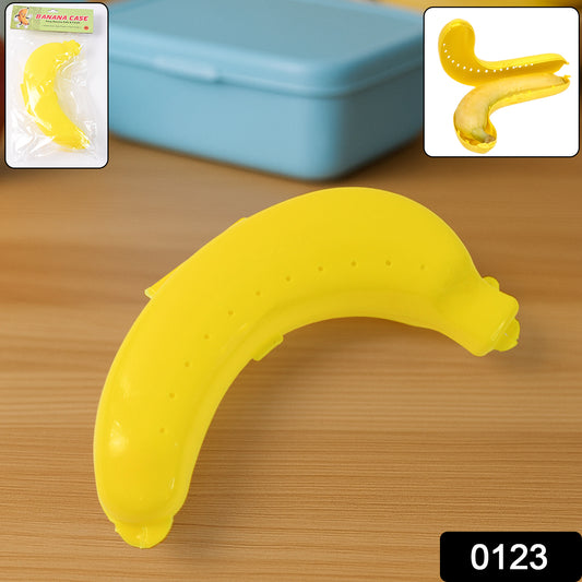 Bright yellow Wukusy banana-shaped lunch box, kitchen tool for storing snacks or meals, with a secure lid and compact design.