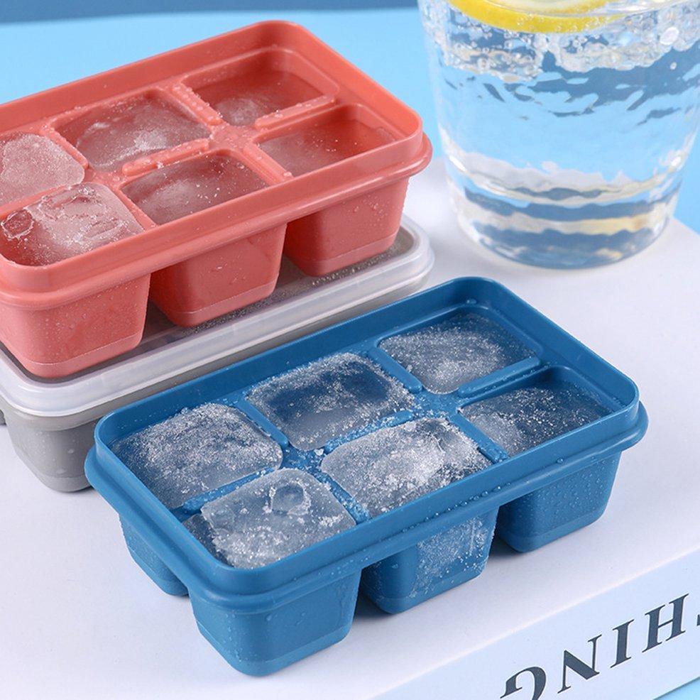 Wukusy 6-grid silicone ice tray with water in molds, used for making ice cubes in household kitchens and food preparation.