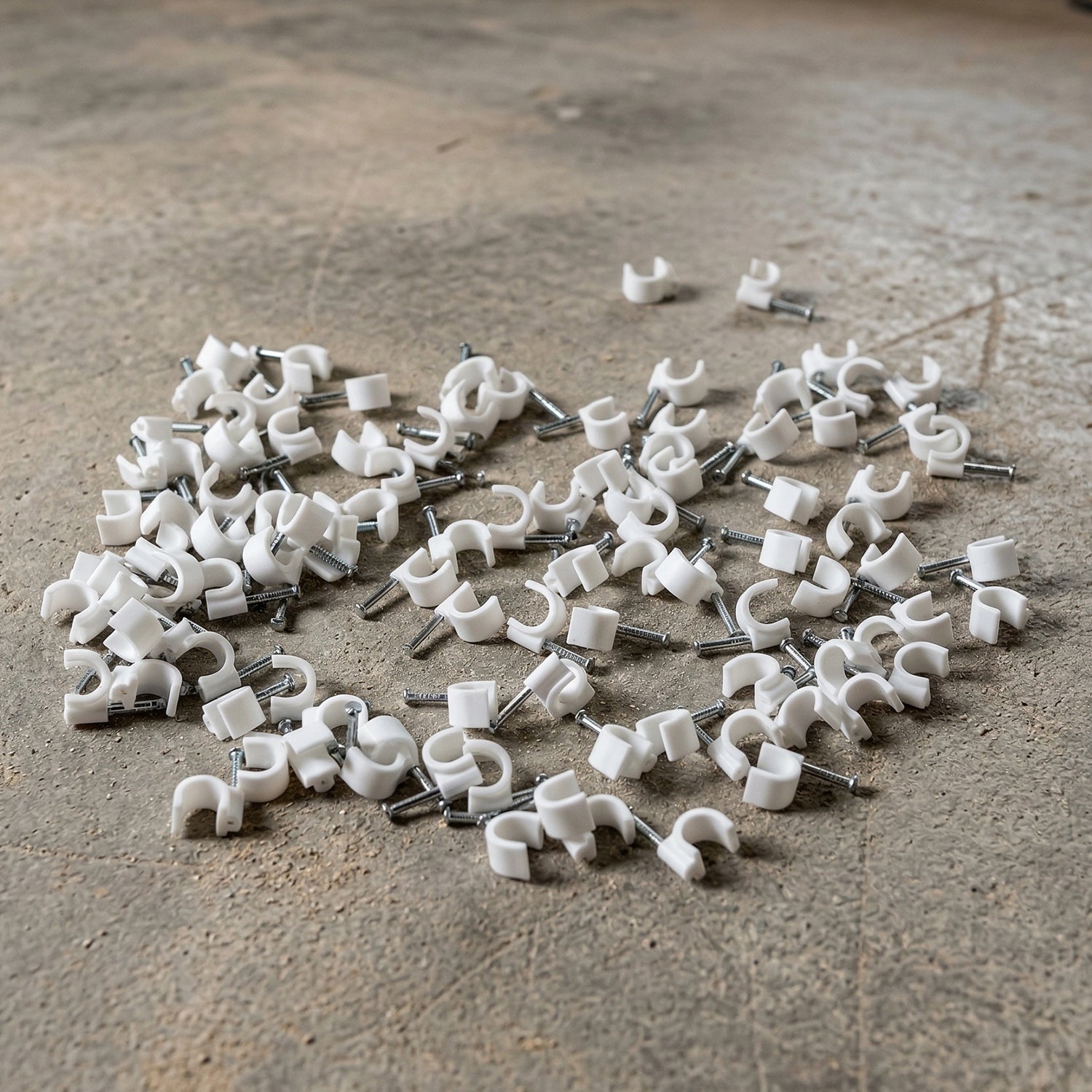 Pack of 100 Wukusy heavy-duty plastic cable clips with steel nails, 8mm size for secure cable management.