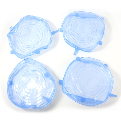 Set of four reusable silicone stretch lids by Wukusy, flexible and airtight for food storage on bowls and containers.