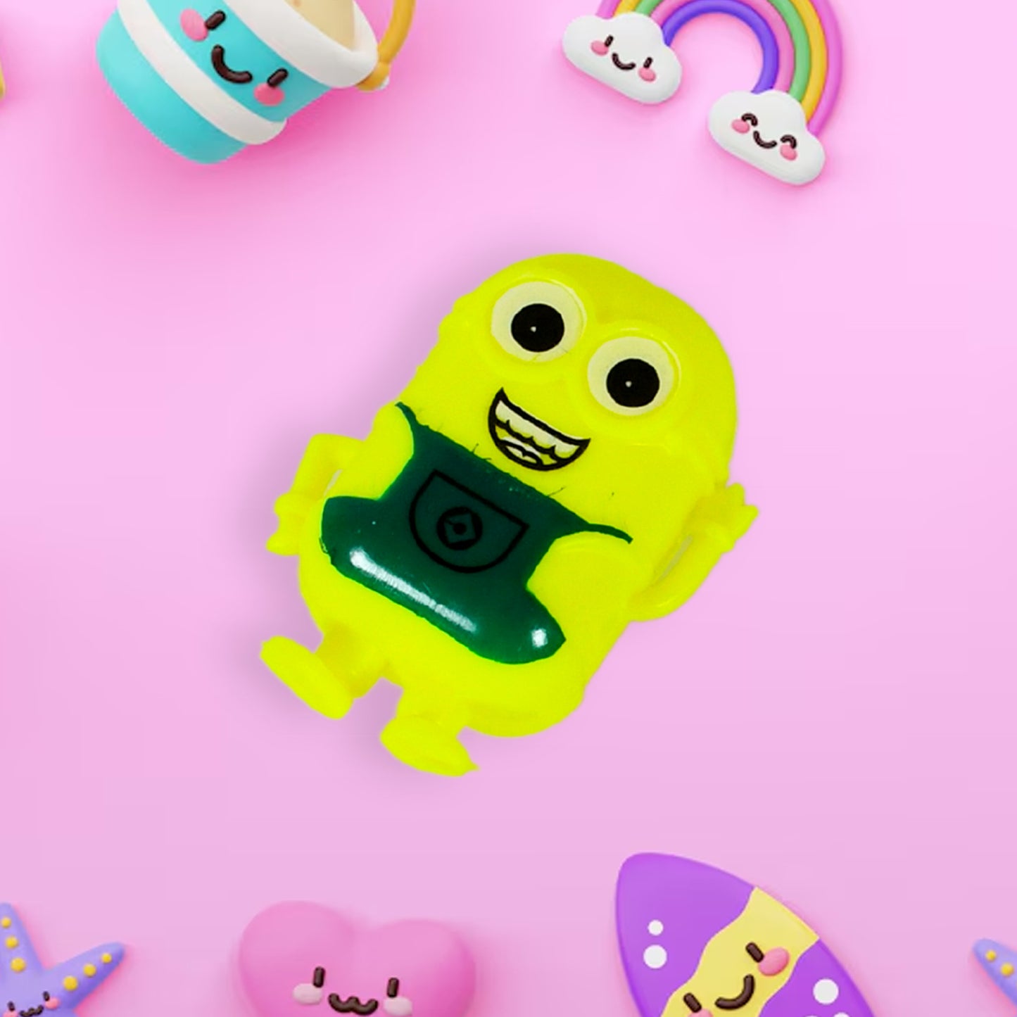 Small green Wukusy Minion toy for kids, featuring a cute, small-sized Minion character with expressive eyes and playful design.