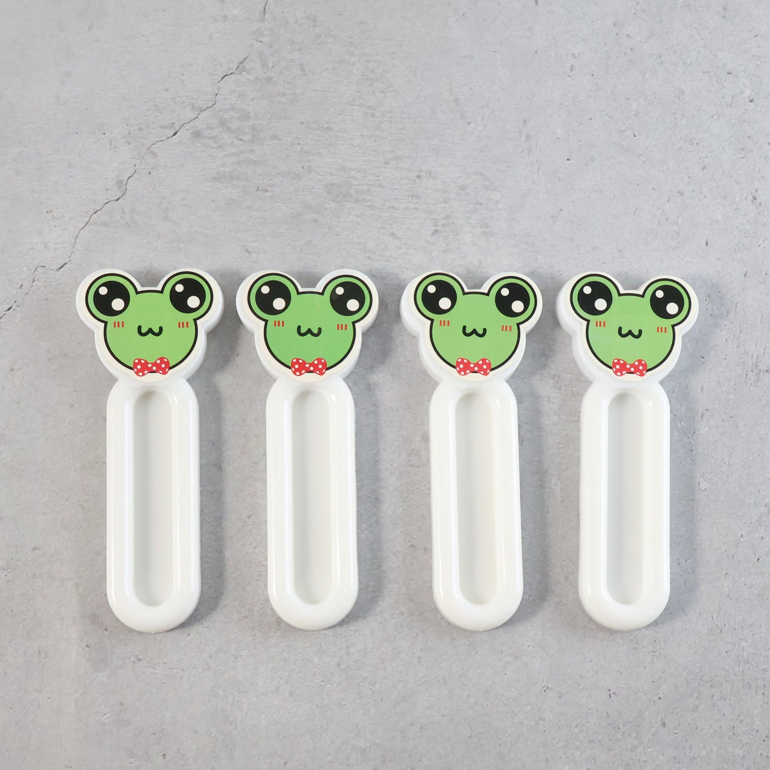 Set of four Wukusy self-stick push pull helper tools for easy door and drawer operation in home and kitchen use.