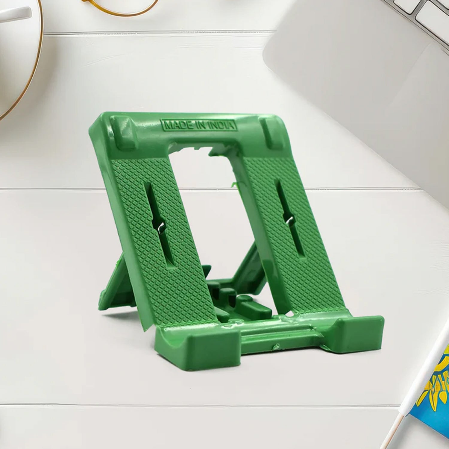 Wukusy 610 adjustable 4-step foldable mobile stand holder for smartphones, black plastic with grip pads and adjustable angles.