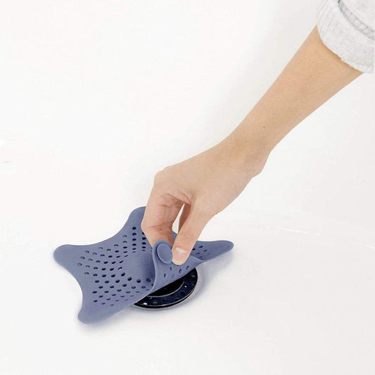 Wukusy silicone star-shaped sink filter in bathroom, hair catcher and drain strainer for basin, flexible and easy to use.