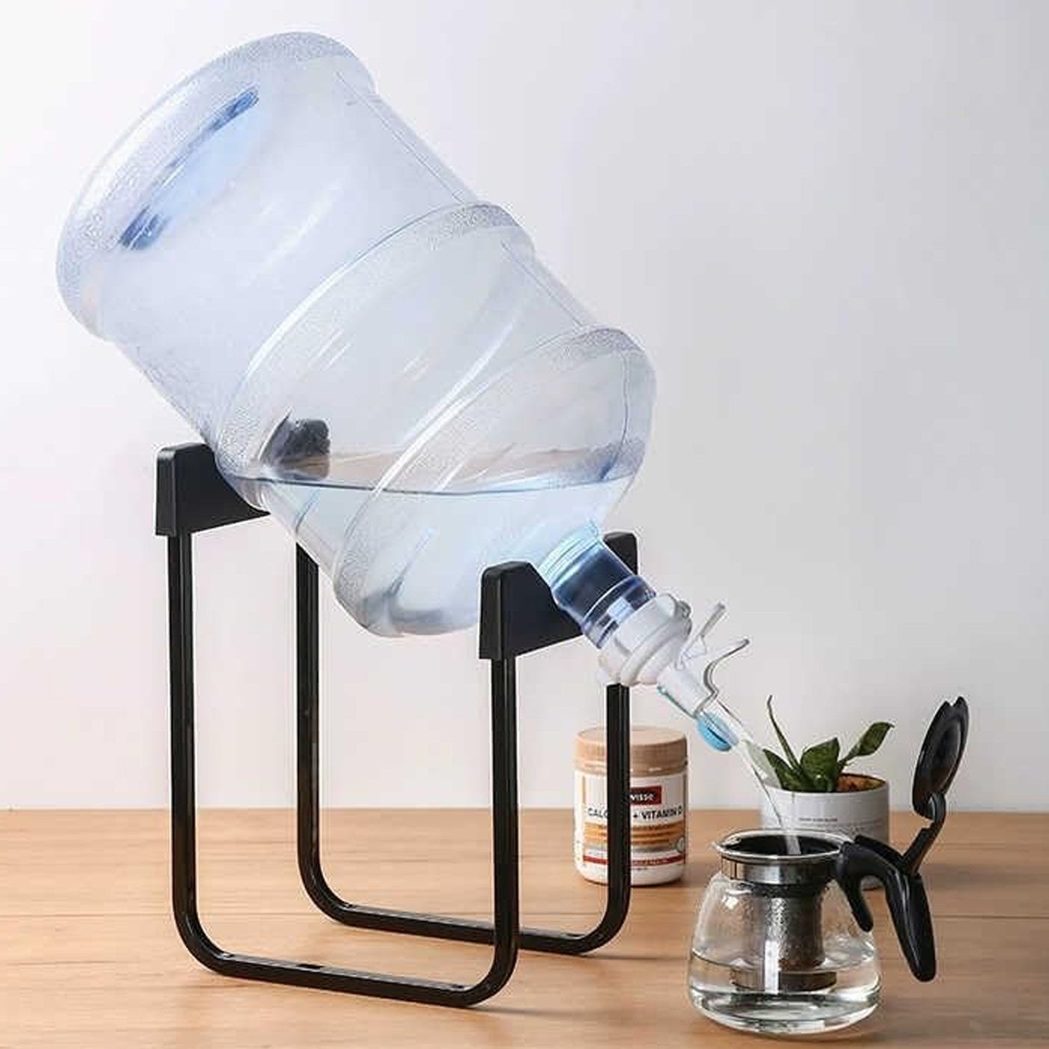 Heavy-duty metal water can bottle dispenser stand for 20-liter bottles, designed by Wukusy, sturdy holder for water bottles.