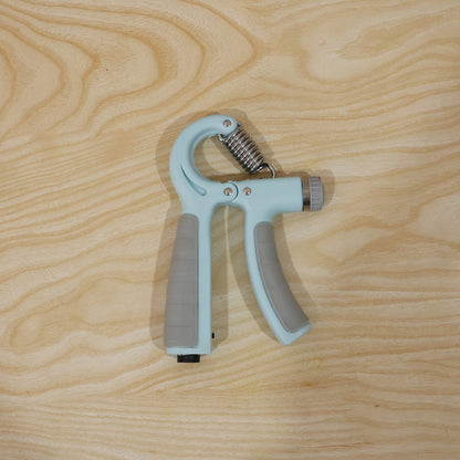 Wukusy adjustable hand grip strengthener for forearm exercise, showing black grip handles and tension adjustment mechanism.