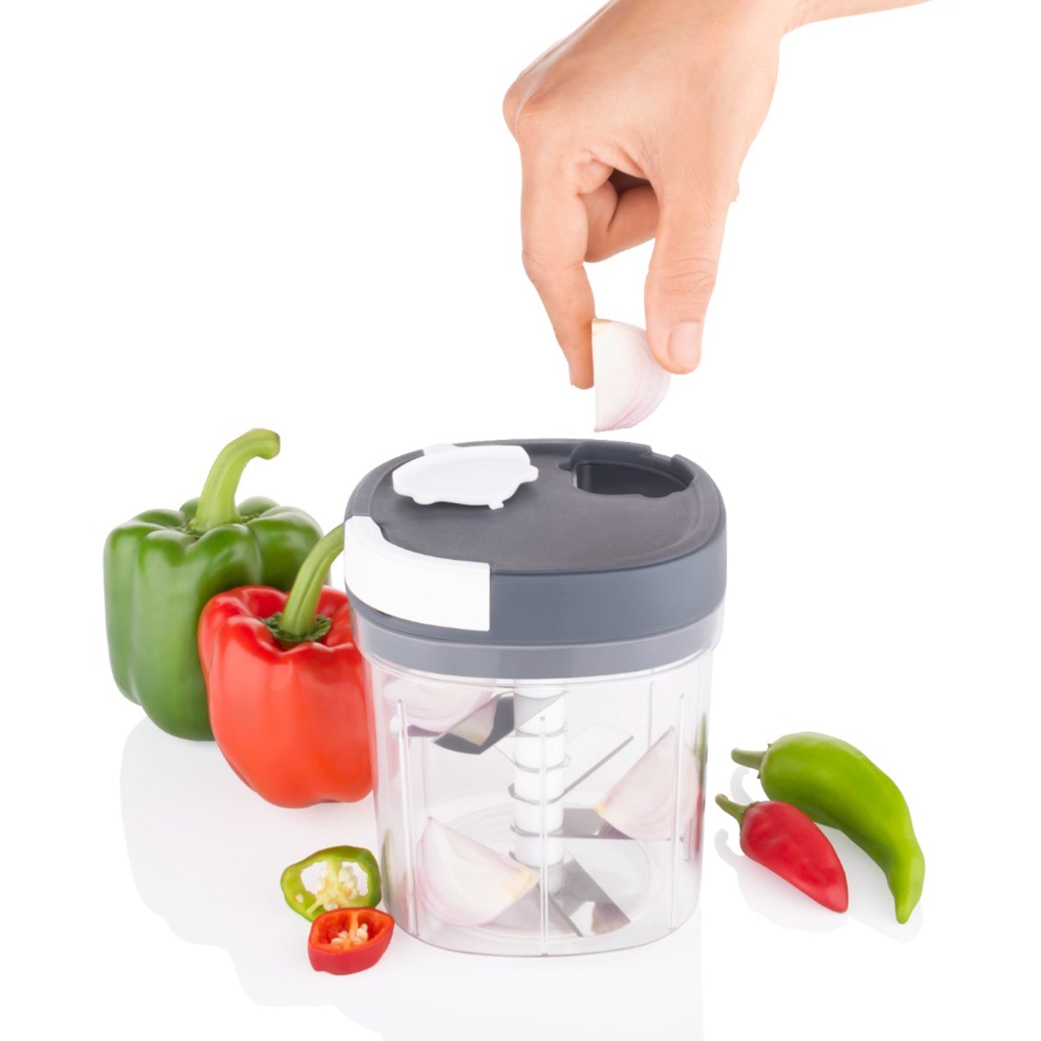 Wukusy 2-in-1 handy chopper and slicer with stainless steel blades for chopping vegetables, fruits, cheese, and more in the kitchen.