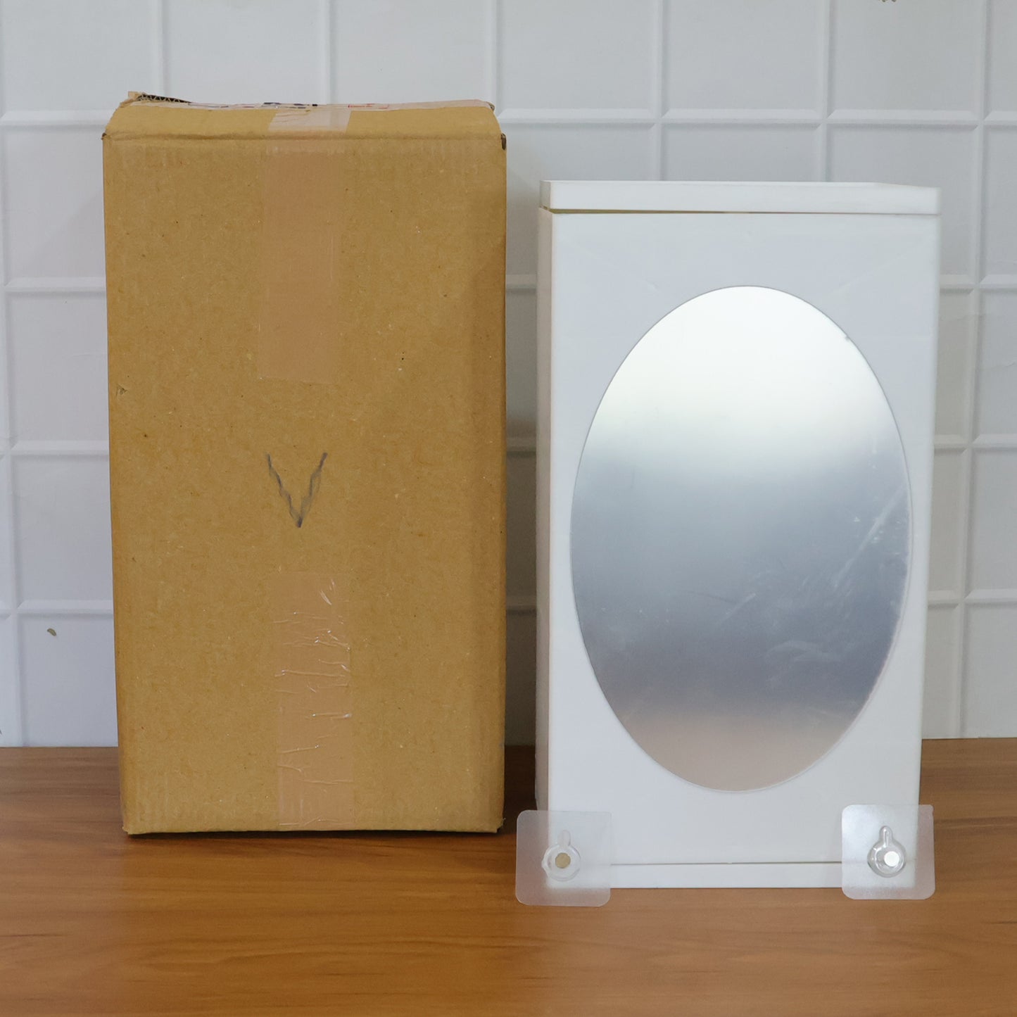 Wall-mounted Wukusy bathroom mirror cabinet with rotating mirror and storage, measuring 22x42 cm, featuring a sleek modern design.