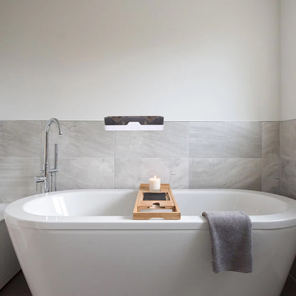 Wall mounted adhesive bathroom shower caddy shelf by Wukusy, made of plastic, for organizing shower essentials.