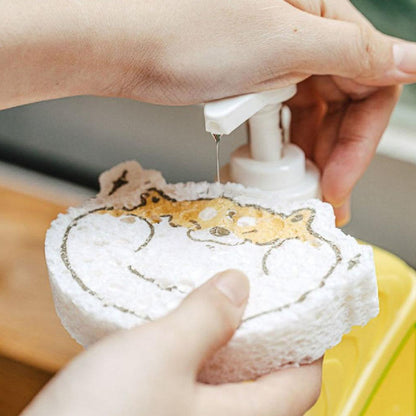 Wukusy 6428a compressed wood pulp sponge with a cartoon design, used as a kitchen dishwashing and cleaning absorbing pad.