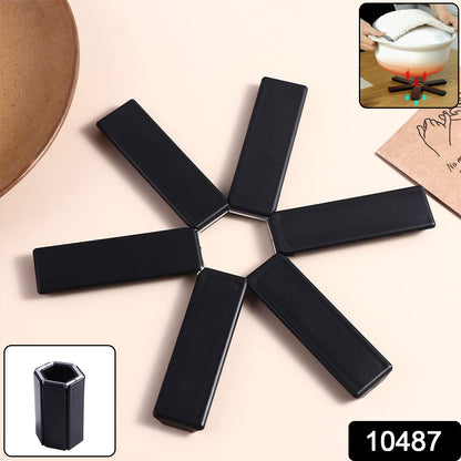 Foldable insulated trivet mat by Wukusy for hot pots, used as a heat-resistant pad for kitchen cookware and hot serving dishes.