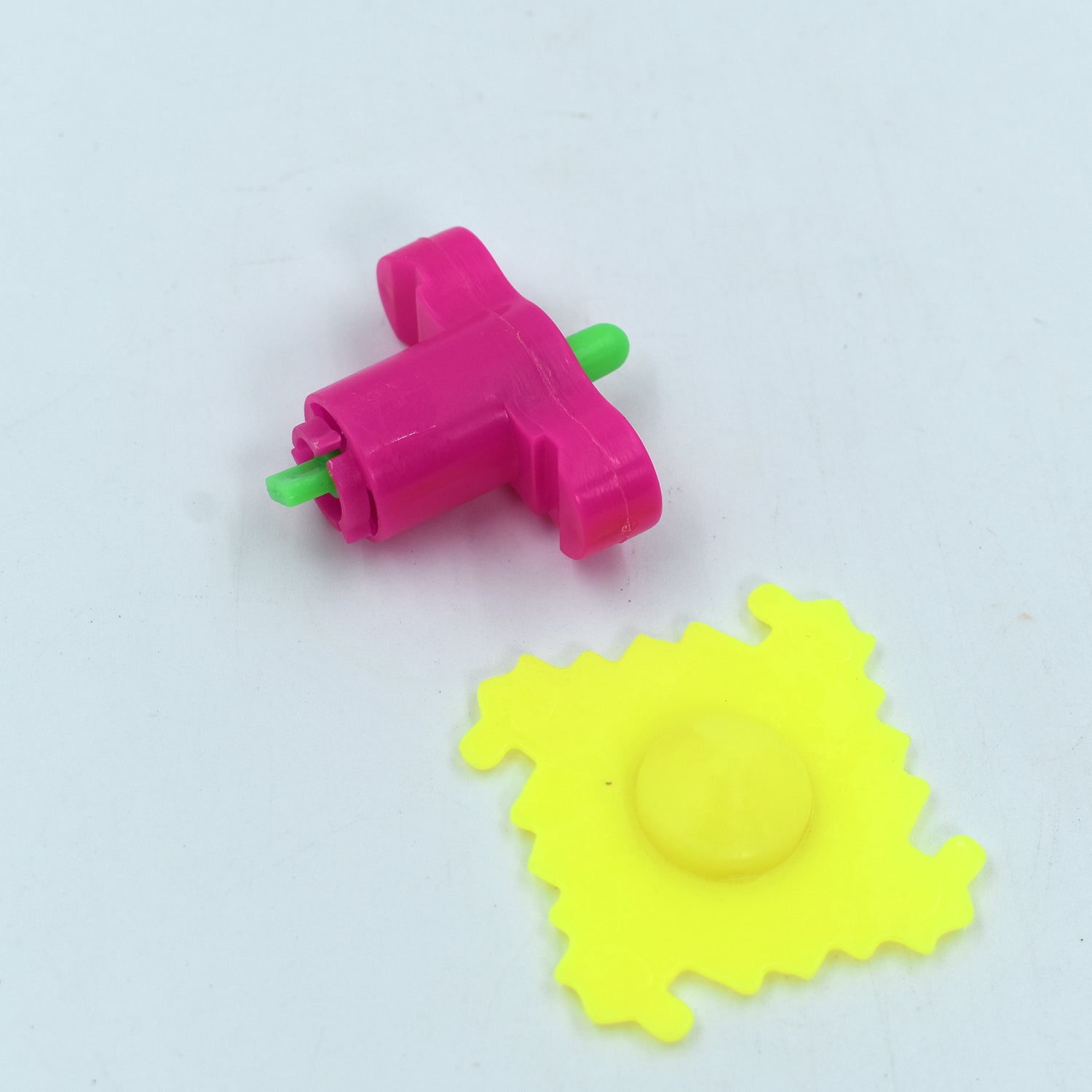 Wukusy 4426 Toy Spinner Launcher for Kids, 30-piece set with colorful spinning toy and launcher for active play.