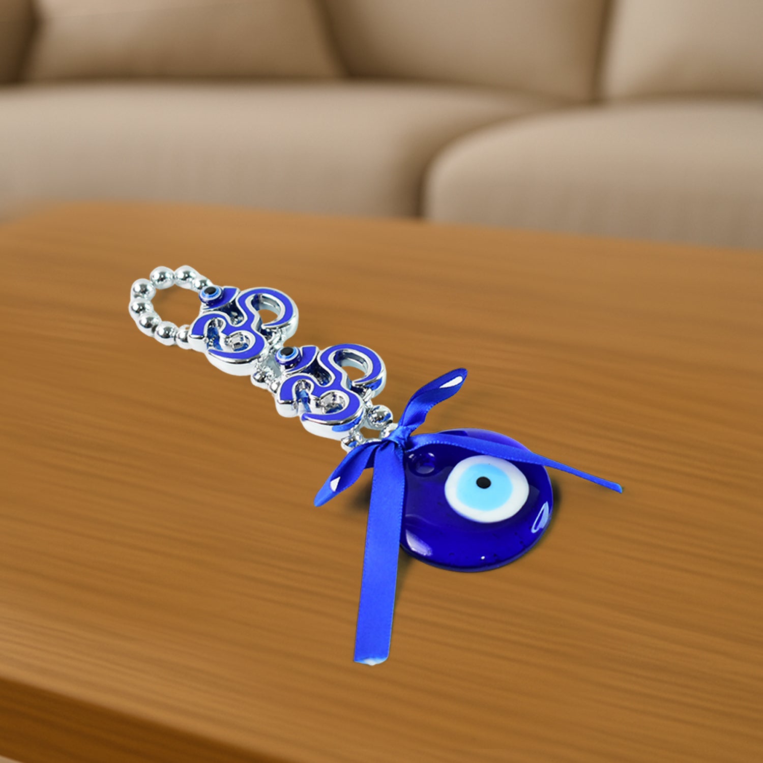 Decorative double Om symbol evil eye hanging from Wukusy, featuring intricate design and vibrant colors, ideal for wall decor.