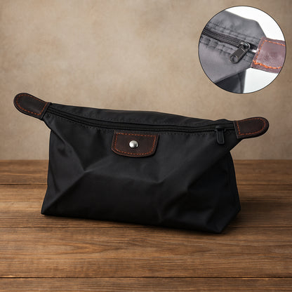 Wukusy premium multipurpose travel bag organizer pouch with compartments for toiletries, cosmetics, or accessories, black fabric.