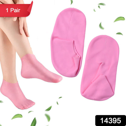 Pair of Wukusy silicone moisturizing socks for softening and hydrating feet, shown in a close-up image on a white background.