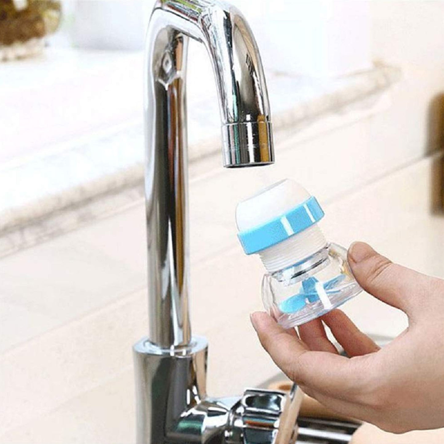 Wukusy adjustable kitchen sink water filter tap with rotating sprayer, stainless steel finish, installed on kitchen sink faucet