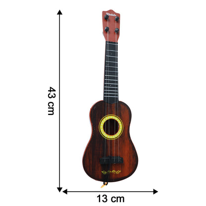 Young child holding a Wukusy classic wooden ukulele guitar, ideal for beginners and kids, with a natural wood finish.