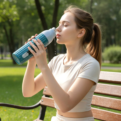 Wukusy Aqua Sports Sipper Water Bottle, 1000 ml, clear plastic with blue lid and built-in sipper for active hydration.