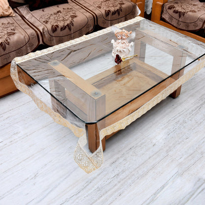 Transparent PVC table cover from Wukusy, 87x59 inches, showing a clear, protective plastic surface on a dining table.
