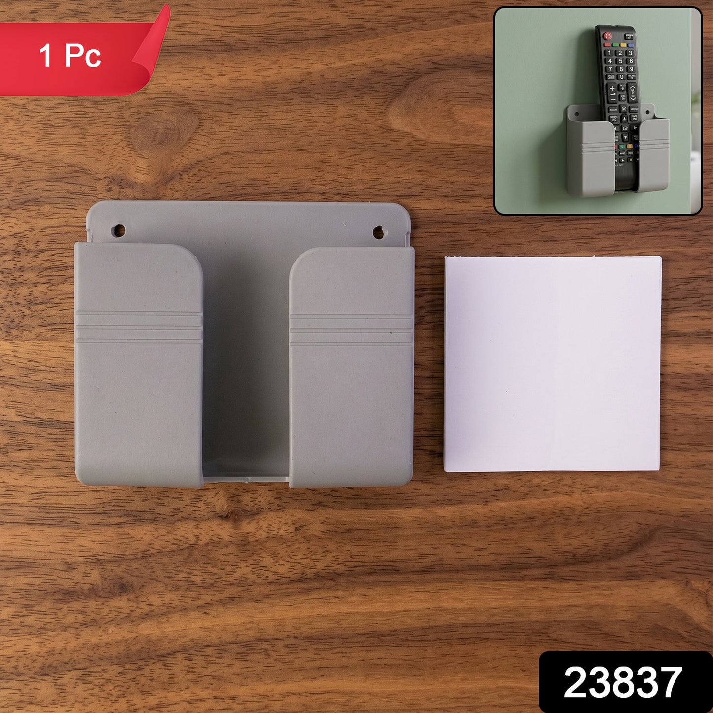 Wall-mounted Wukusy mobile remote holder, space-saving organizer for keeping remote controls tidy and easily accessible.