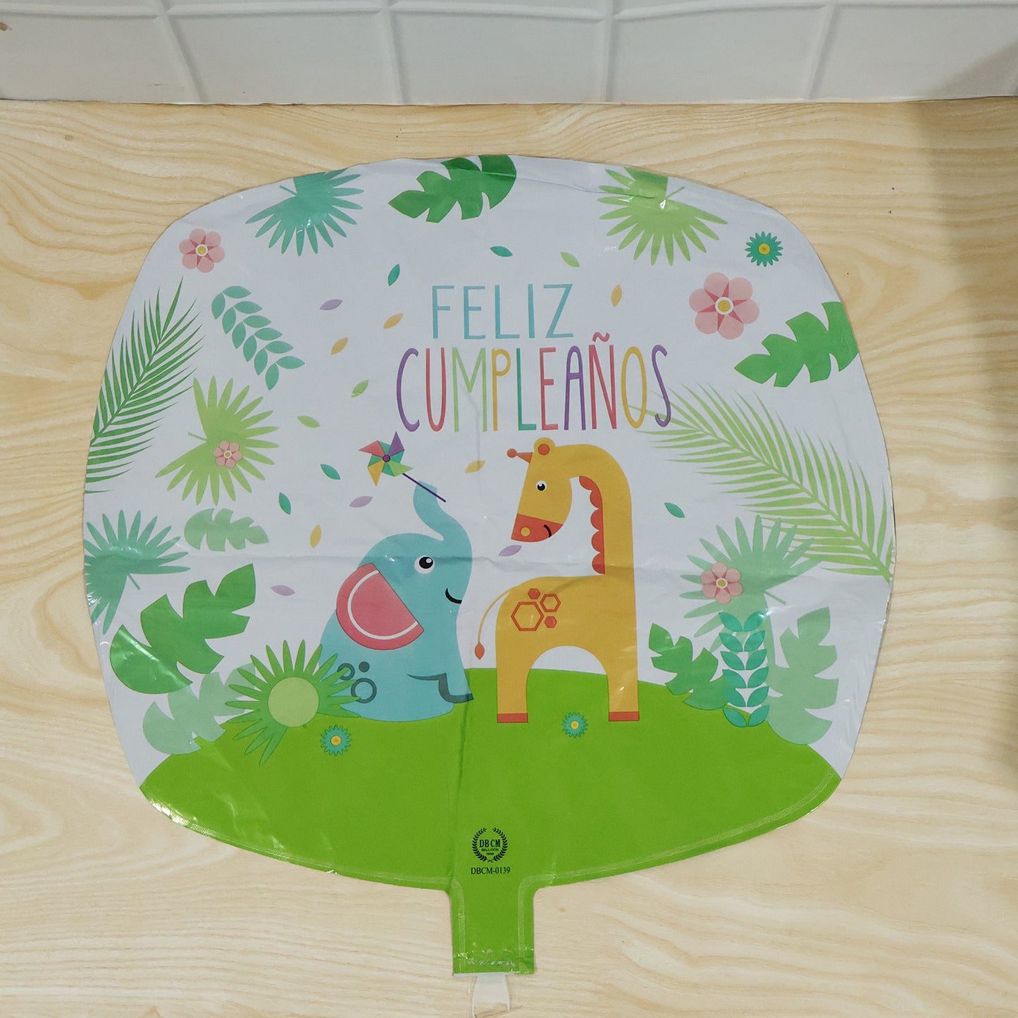 Gold jungle theme lion birthday foil balloon with jungle leaves design, perfect for children's birthday celebrations.