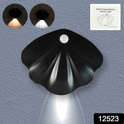 Shell-shaped Wukusy motion sensor night light for home decor, with a soft glow and decorative shell design.